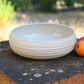 Assiette creuse striée